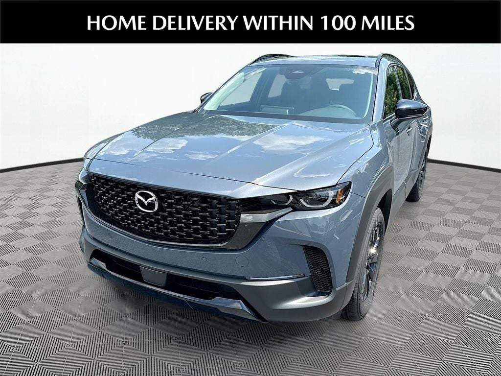 2026 Mazda Mazda CX-50 Hybrid Premium AWD in Polymetal Gray Metallic — front three-quarter view