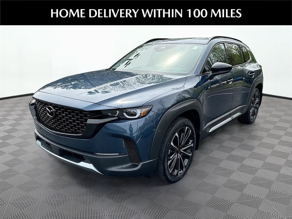 2026 Mazda Mazda CX-50 2.5 Turbo Premium Plus AWD in Ingot Blue Metallic — front three-quarter view