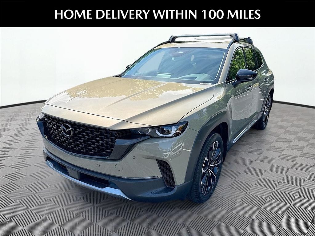 2026 Mazda Mazda CX-50 2.5 Turbo Premium Plus AWD in Zircon Sand Metallic — front three-quarter view