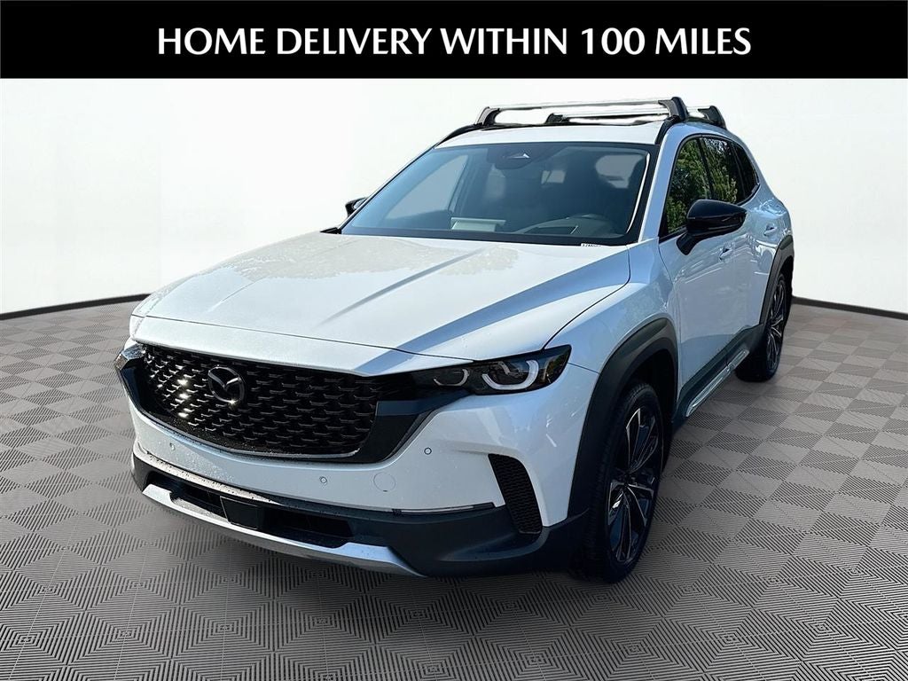 2026 Mazda Mazda CX-50 2.5 Turbo Premium Plus AWD in Wind Chill Pearl — front three-quarter view