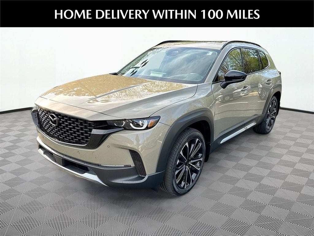 2026 Mazda Mazda CX-50 2.5 Turbo Premium Plus AWD in Zircon Sand Metallic — front three-quarter view