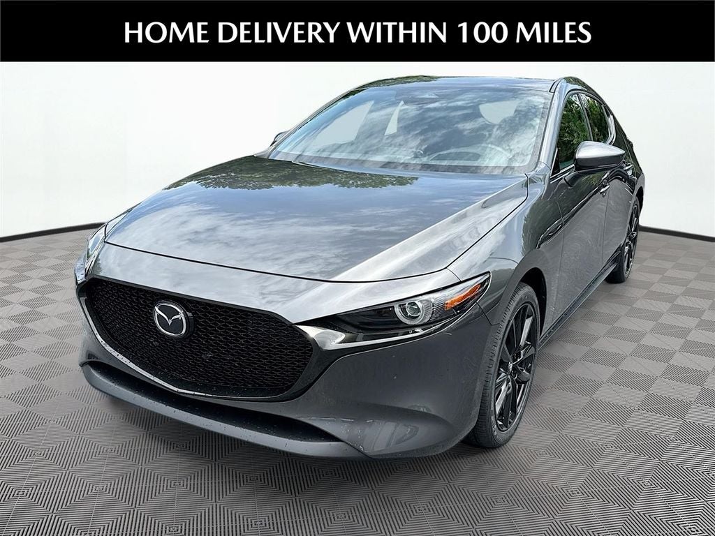 2026 Mazda Mazda3 Hatchback 2.5 S Premium in Machine Gray Metallic — front three-quarter view
