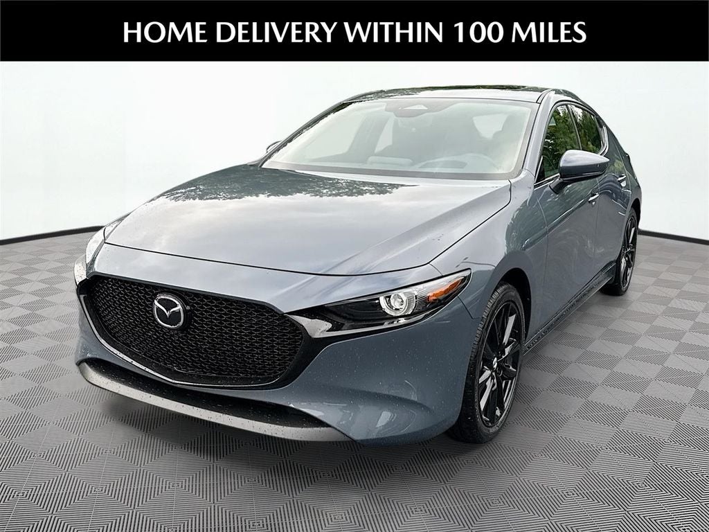 2026 Mazda Mazda3 Hatchback 2.5 S Premium in Polymetal Gray Metallic — front three-quarter view