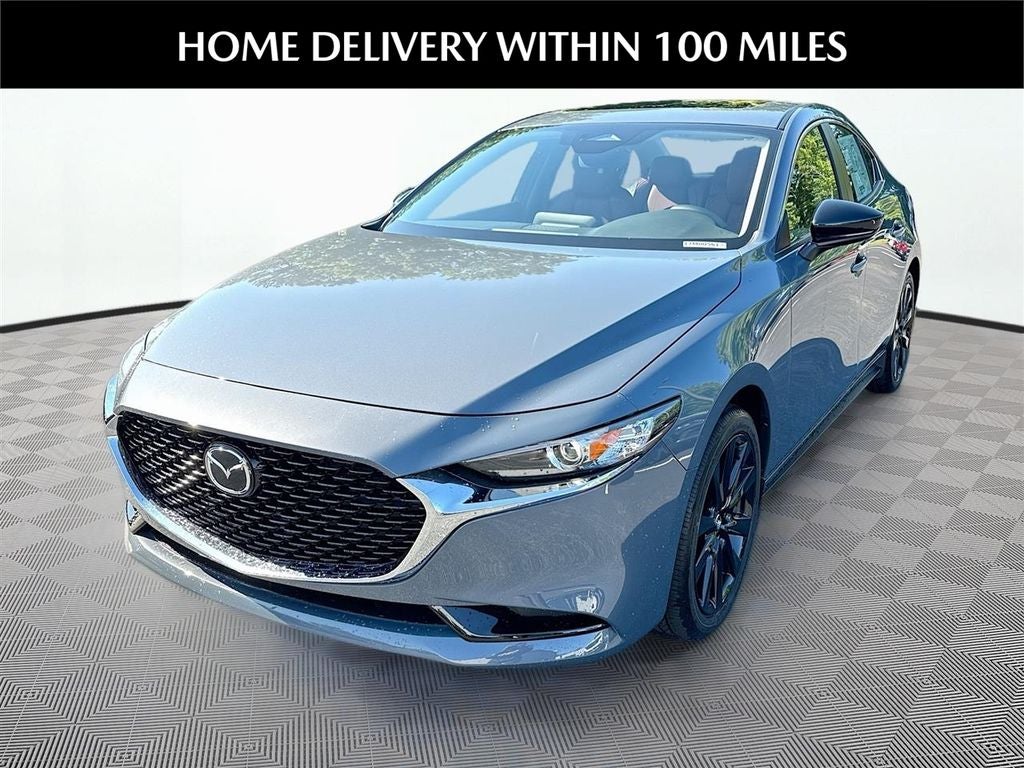 2026 Mazda Mazda3 Sedan 2.5 S Carbon Edition AWD in Polymetal Gray Metallic — front three-quarter view