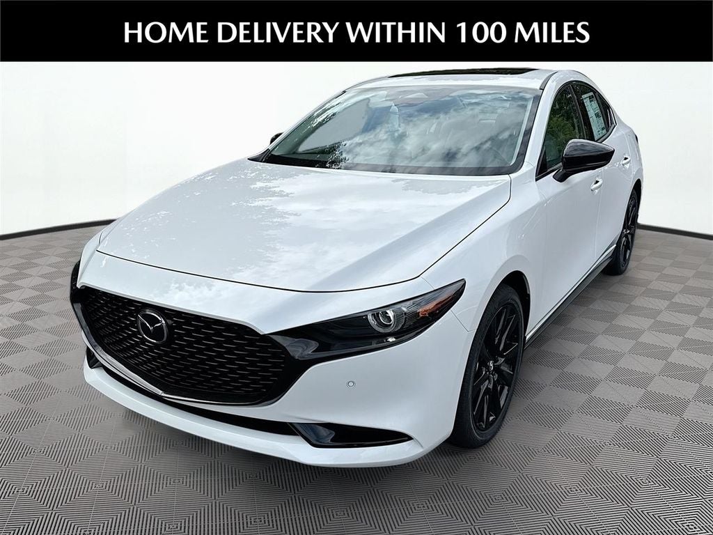 2026 Mazda Mazda3 Sedan 2.5 Turbo Premium Plus AWD in Snowflake White Pearl — front three-quarter view