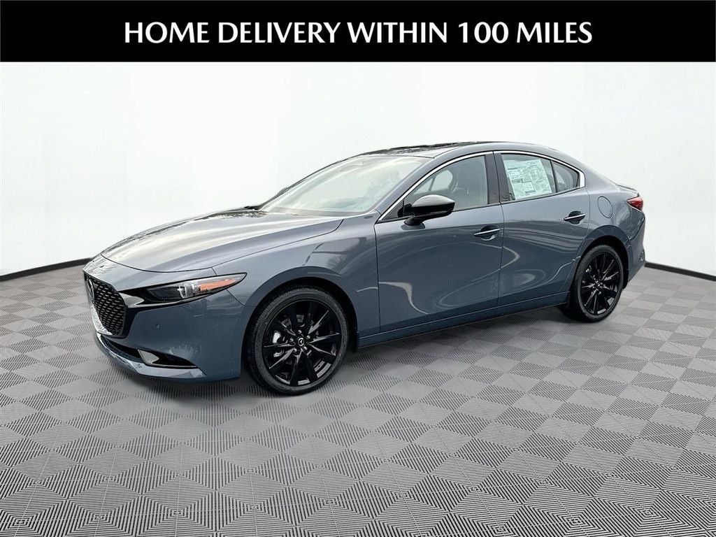 2026 Mazda Mazda3 Sedan 2.5 Turbo Premium Plus AWD in Polymetal Gray Metallic — front three-quarter view