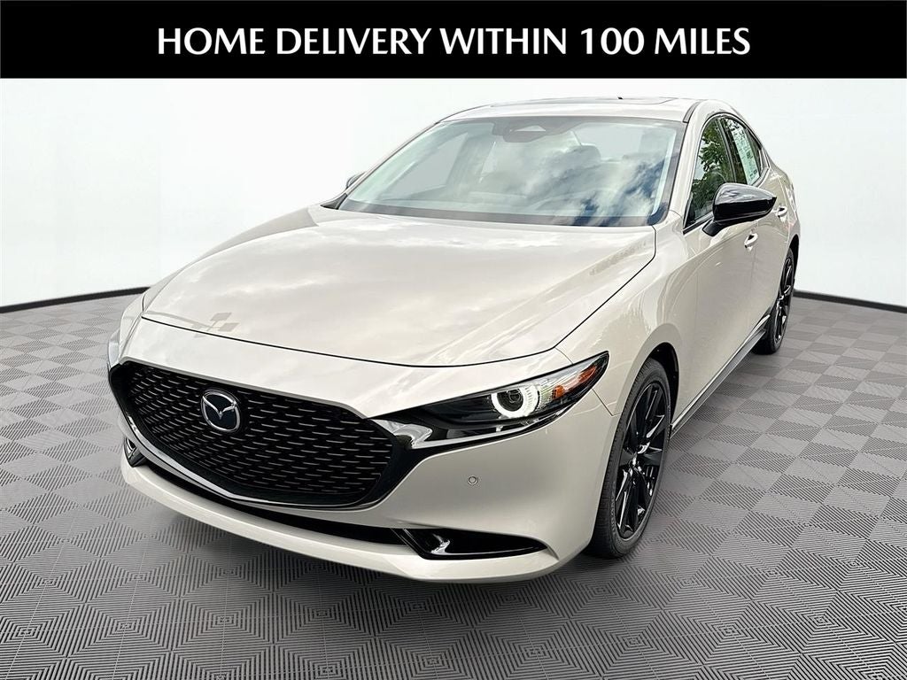 2026 Mazda Mazda3 Sedan 2.5 Turbo Premium Plus AWD in Platinum Quartz Metallic — front three-quarter view