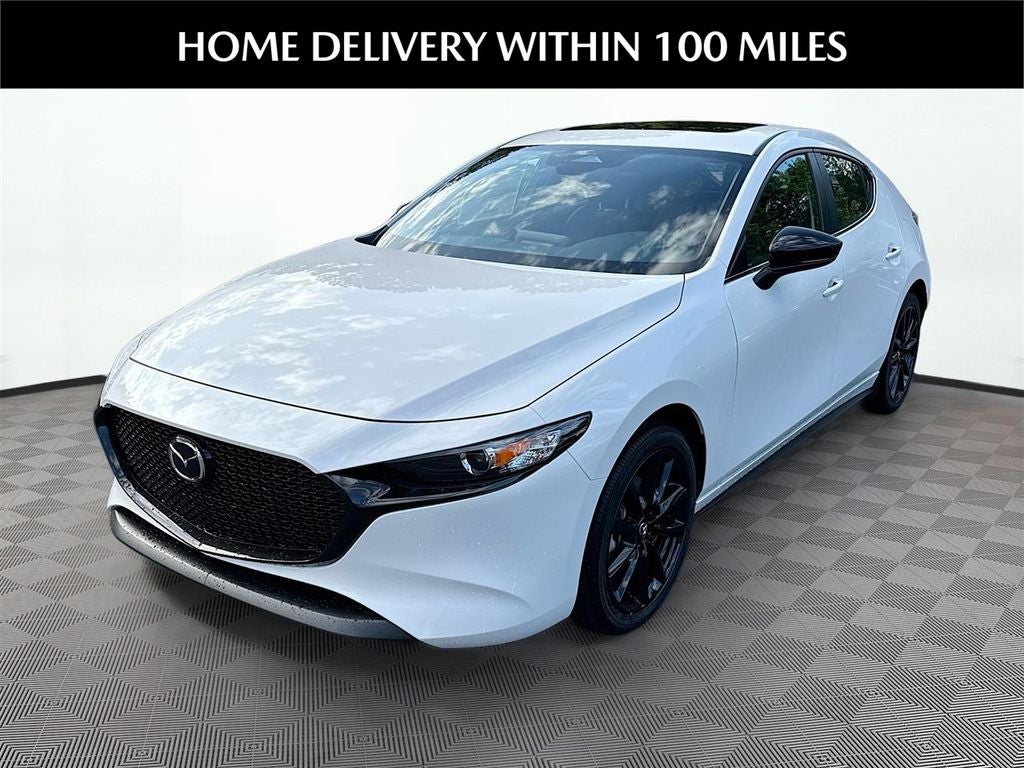 2026 Mazda Mazda3 Hatchback 2.5 S Carbon Edition AWD in Snowflake White Pearl — front three-quarter view