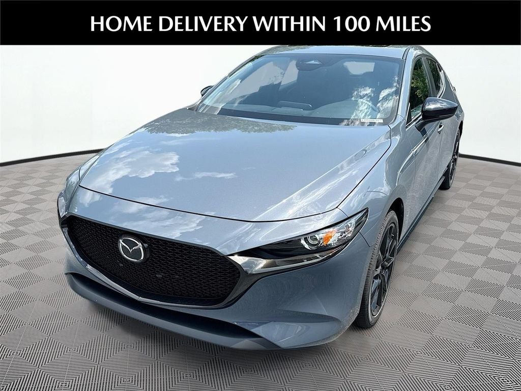 2026 Mazda Mazda3 Hatchback 2.5 S Carbon Edition AWD in Polymetal Gray Metallic — front three-quarter view