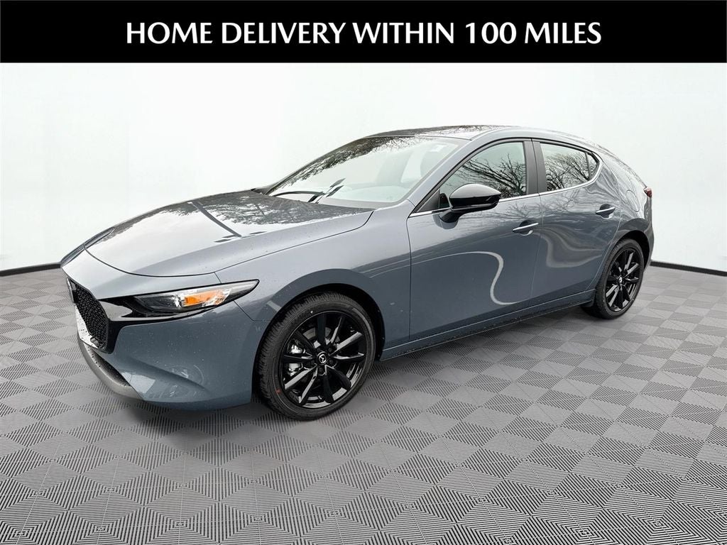 2026 Mazda Mazda3 Hatchback 2.5 S Carbon Edition AWD in Polymetal Gray Metallic — front three-quarter view