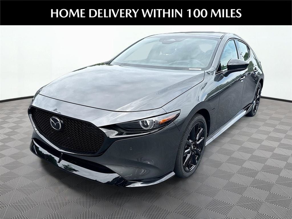 2026 Mazda Mazda3 Hatchback 2.5 Turbo Premium Plus AWD in Machine Gray Metallic — front three-quarter view