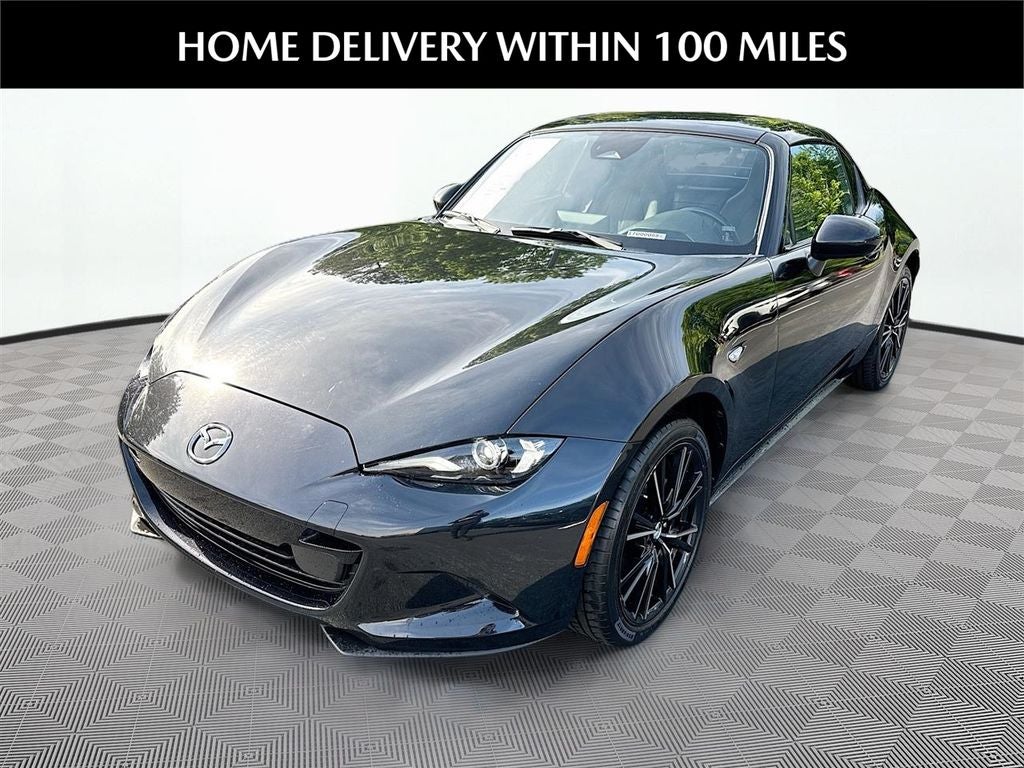 2024 Mazda Mazda MX-5 Miata RF Grand Touring in Jet Black Mica — front three-quarter view