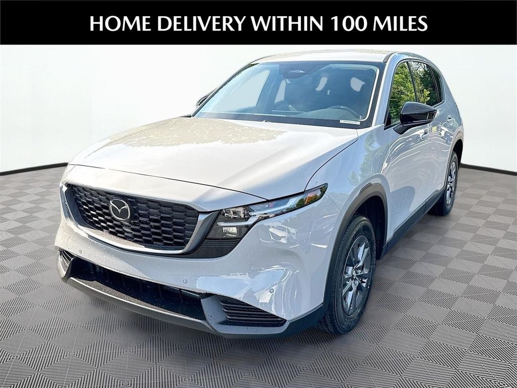 2026 Mazda Mazda CX-5 2.5 S Select AWD in Aero Gray Metallic — front three-quarter view
