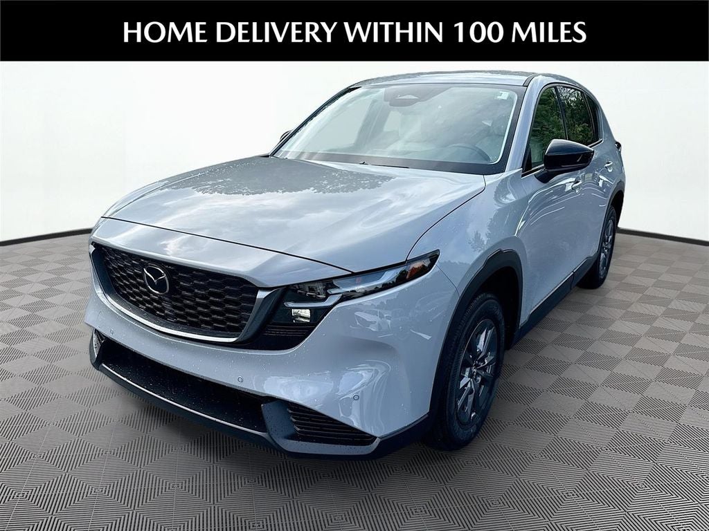 2026 Mazda Mazda CX-5 2.5 S Select AWD in Aero Gray Metallic — front three-quarter view