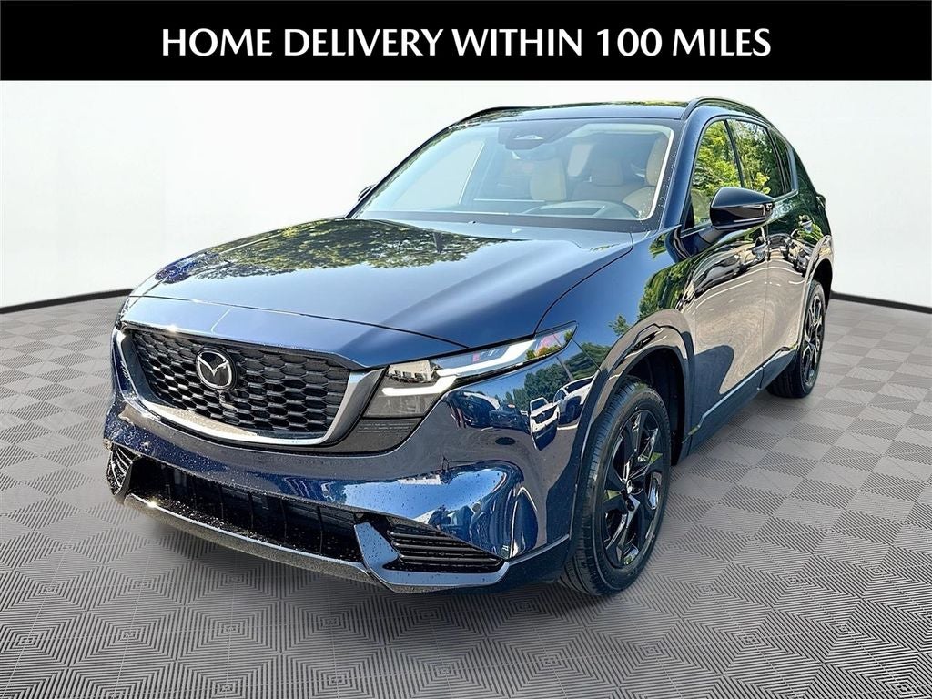2026 Mazda Mazda CX-5 2.5 S Premium Plus AWD in Navy Blue Mica — front three-quarter view