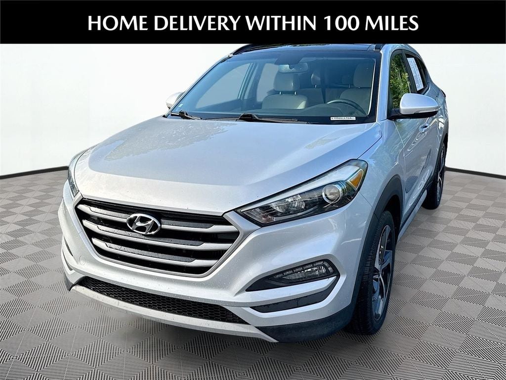2018 Hyundai Tucson Value in Molten Silver — front three-quarter view