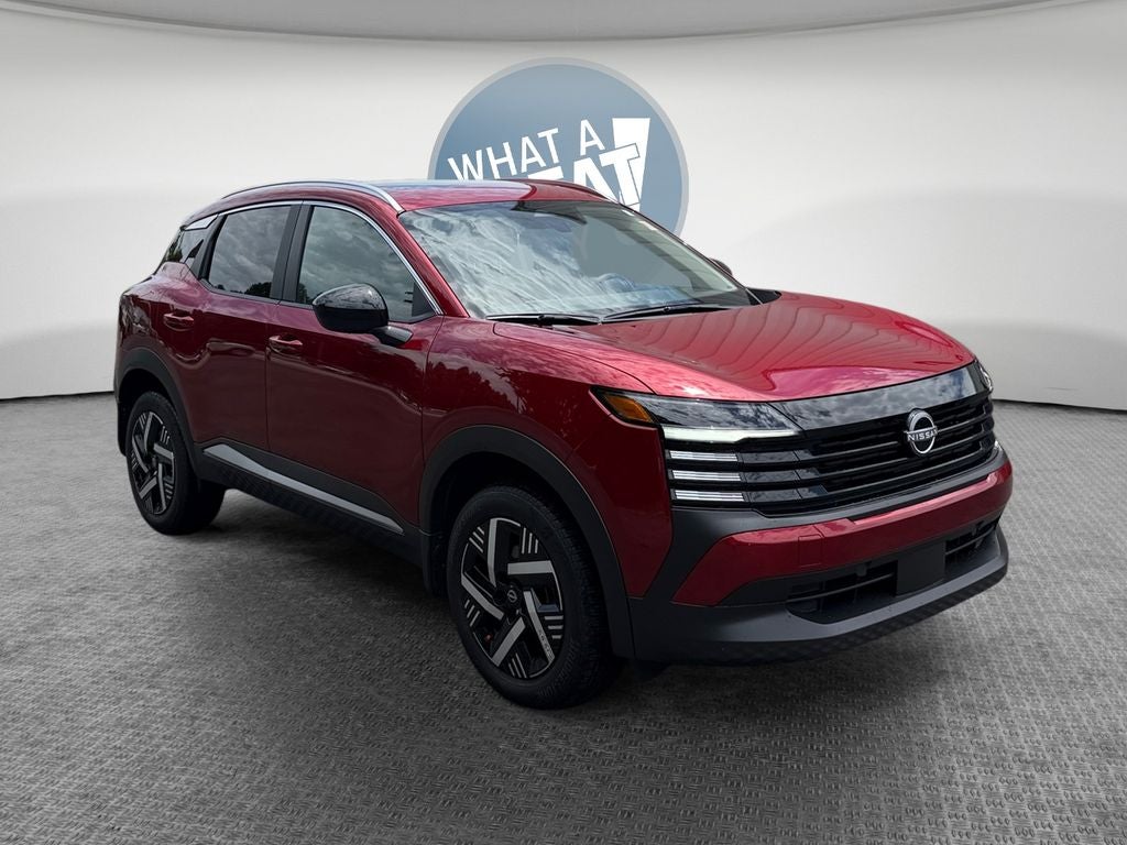 2026 Nissan Kicks SV in Scarlet Ember Tintcoat — front three-quarter view