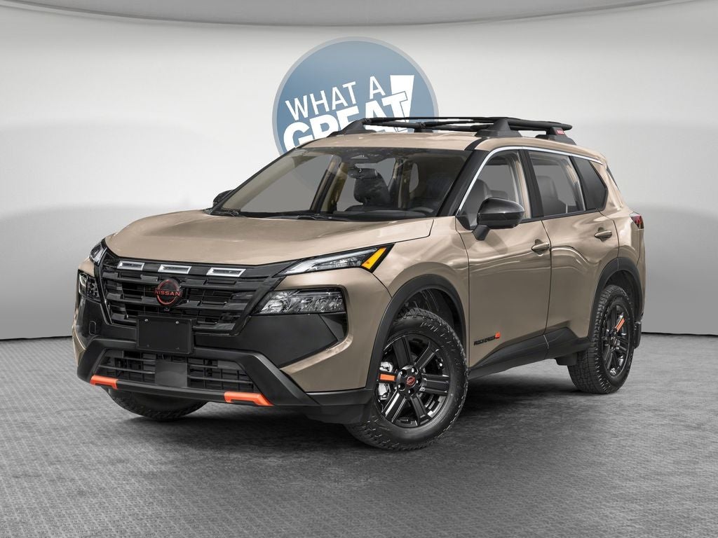 2026 Nissan Rogue Rock Creek in Baja Storm Metallic — front three-quarter view