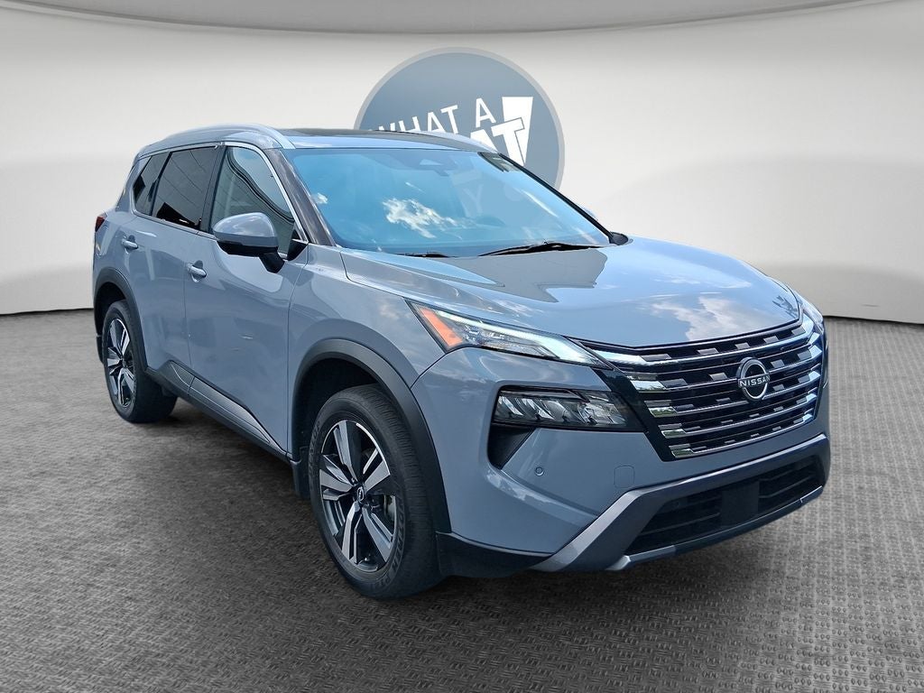 2024 Nissan Rogue SL in Boulder Gray Pearl — front three-quarter view
