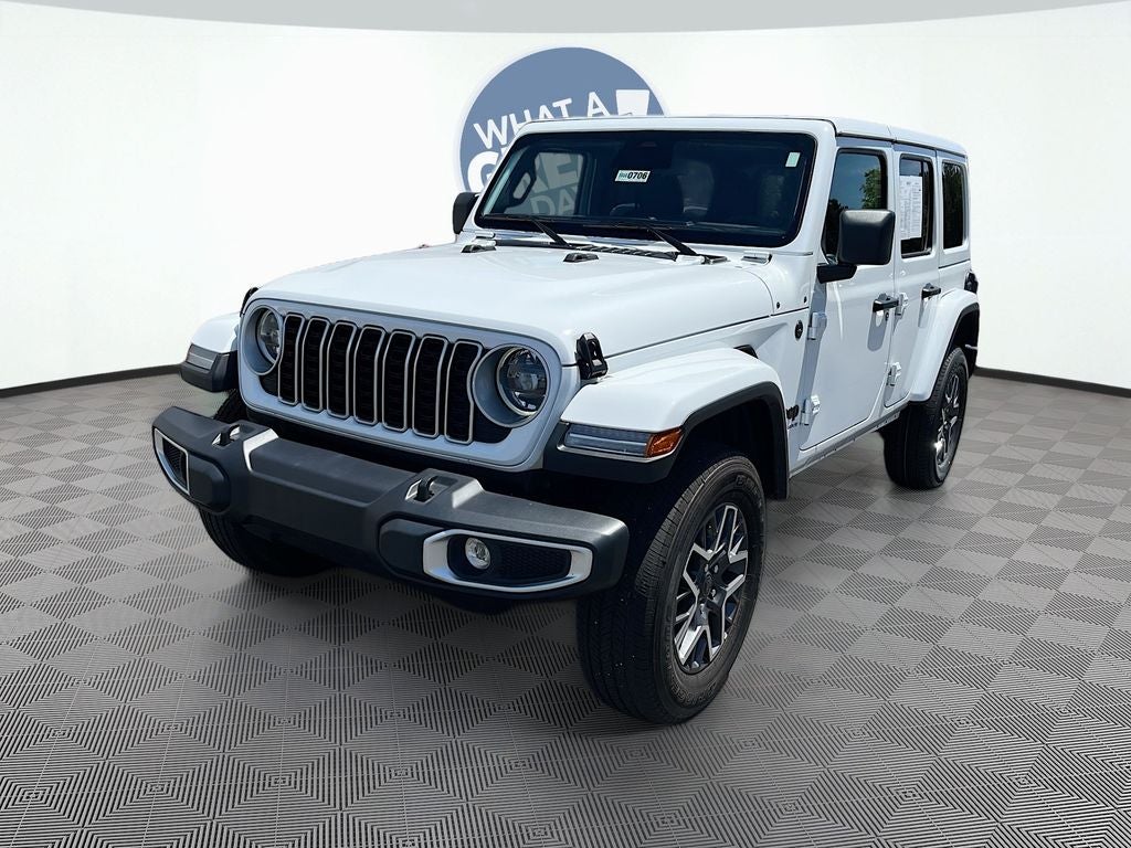 2025 Jeep Wrangler Sahara in Bright White Clearcoat — front three-quarter view