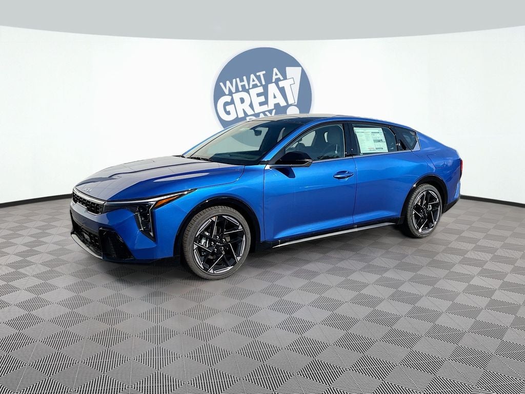 2026 Kia K4 GT-Line in Wave Blue — front three-quarter view