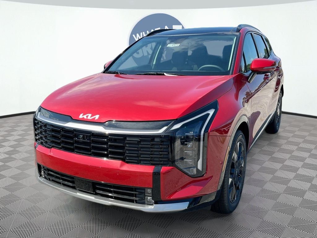 2026 Kia Sportage SX-Prestige in Runway Red — front three-quarter view