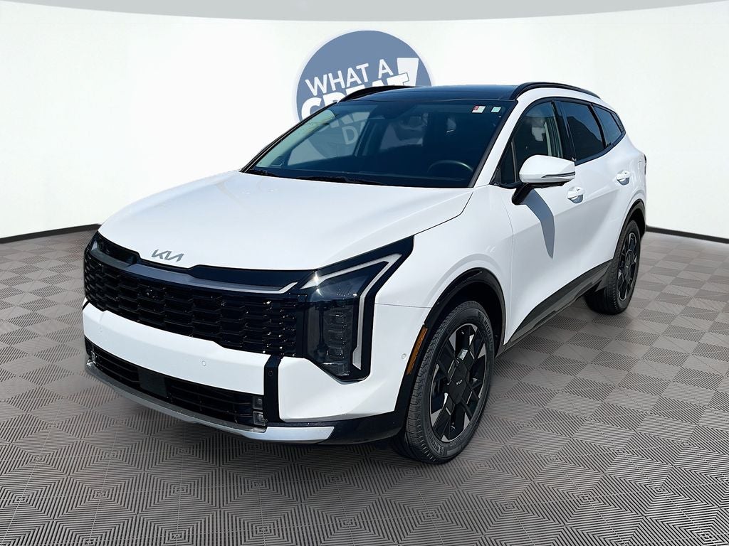 2026 Kia Sportage SX-Prestige in Glacial White Pearl — front three-quarter view