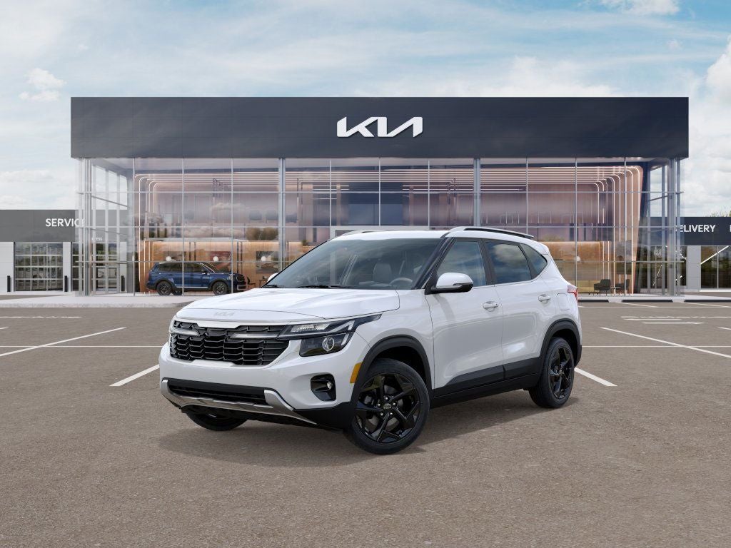 2026 Kia Seltos EX in Snow White Pearl — front three-quarter view