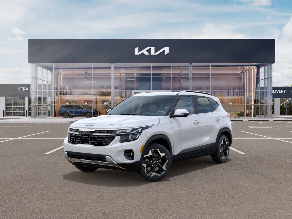 2025 Kia Seltos EX in Snow White Pearl — front three-quarter view