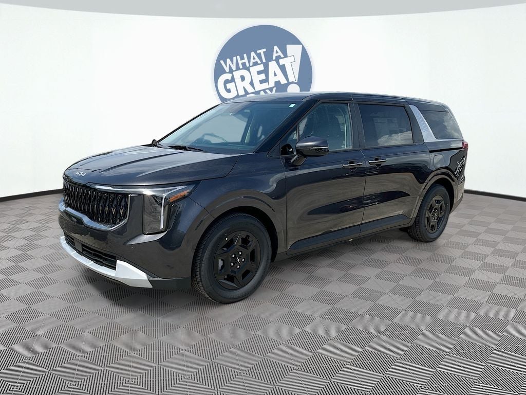 2026 Kia Carnival LX in Panthera Metal — front three-quarter view